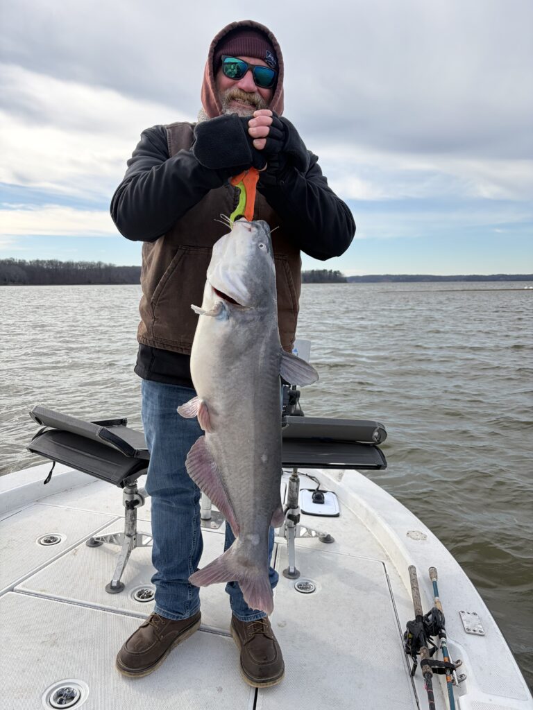 Me fishing, 35" blue catfish, 21 pounds -- biggest fish I've ever caught.